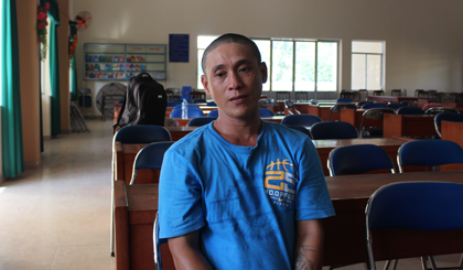 Nghi phạm Bùi Quốc Hùng tại cơ quan công an