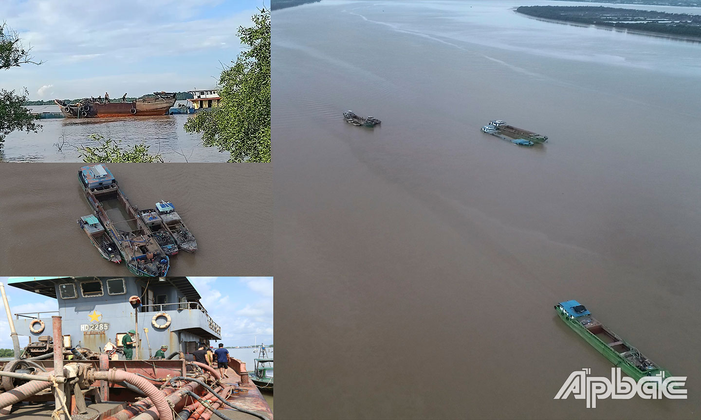 Nhiều sà lan và tàu ngang nhiên khai thác cát trên sông Tiền (đoạn sông Cửa Trung, xã Phú Thạnh, huyện Tân Phú Đông).