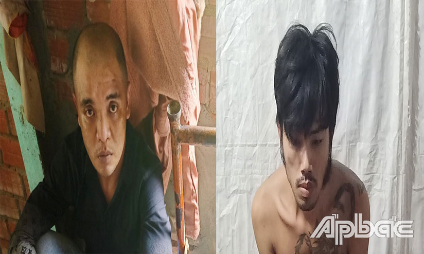 Quang và Nghĩa bị bắt giữ.