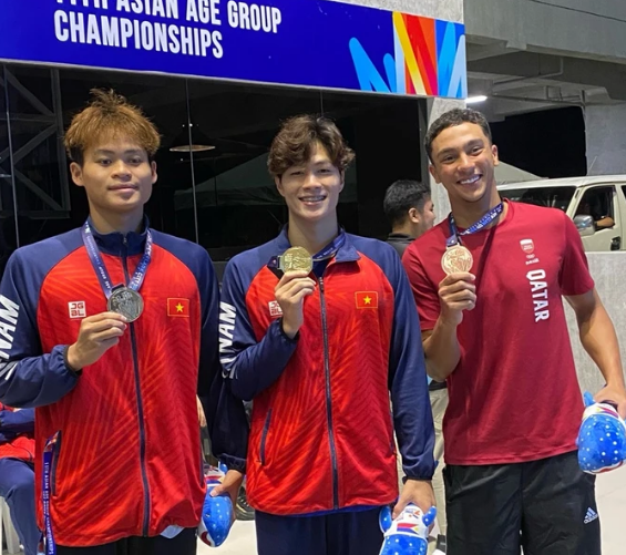Trần Hưng Nguyên (giữa) giành thành tích HCV trong ngày đầu tiên của giải. Ảnh: MINH MINH