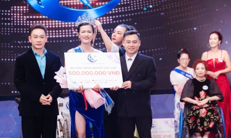 Trái tim nhân ái của “Trăng khuyết” 
Việt Nam Nguyễn Thị Minh Tâm